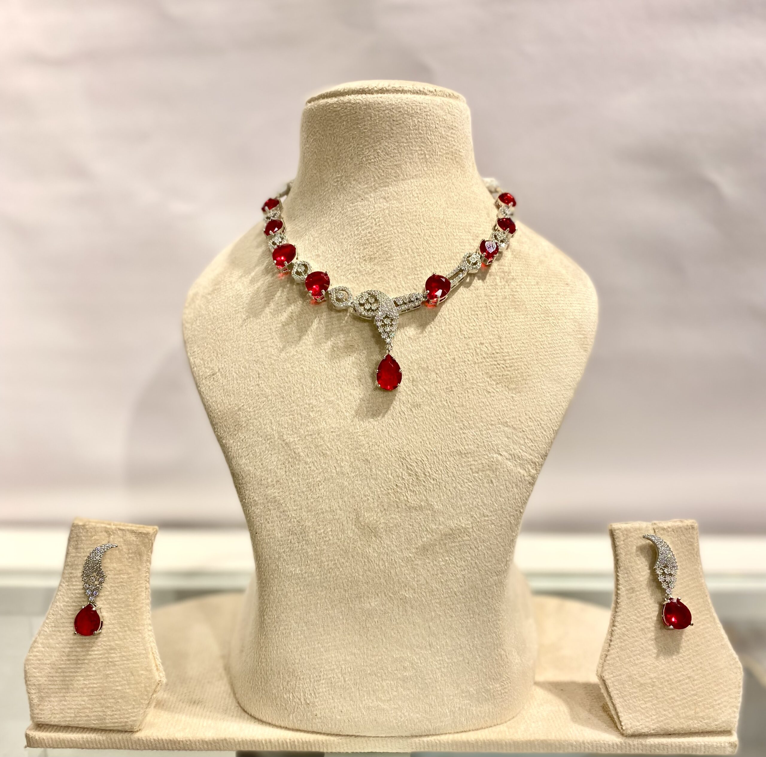 AD Necklace Set with Ruby & Silver Stones and Curved Earrings